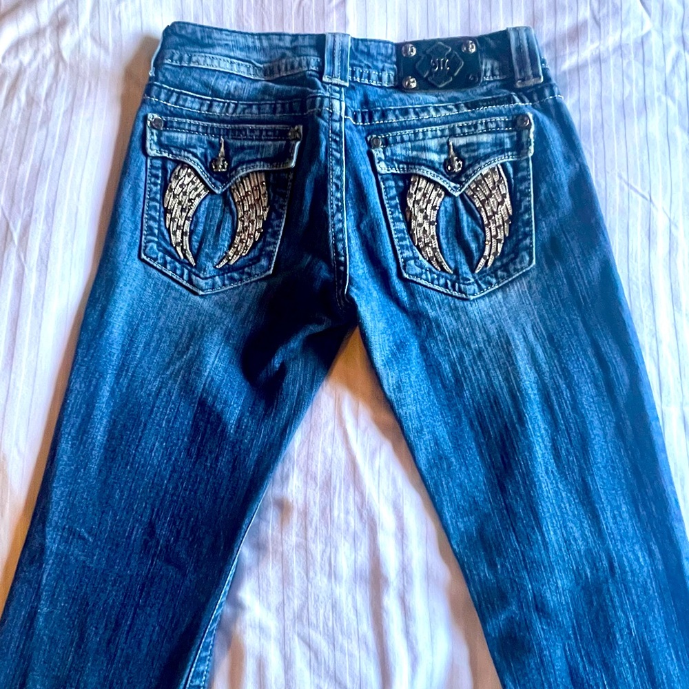 Miss Me jeans with Angel wings on back pocket. Pre loved,excellent condition.